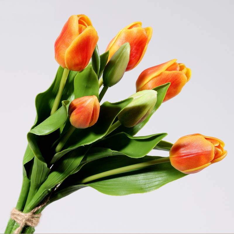 A bouquet of artificial tulips with 7 flowers