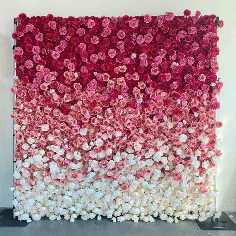Artificial roses wall in a gradient from red, pink to white