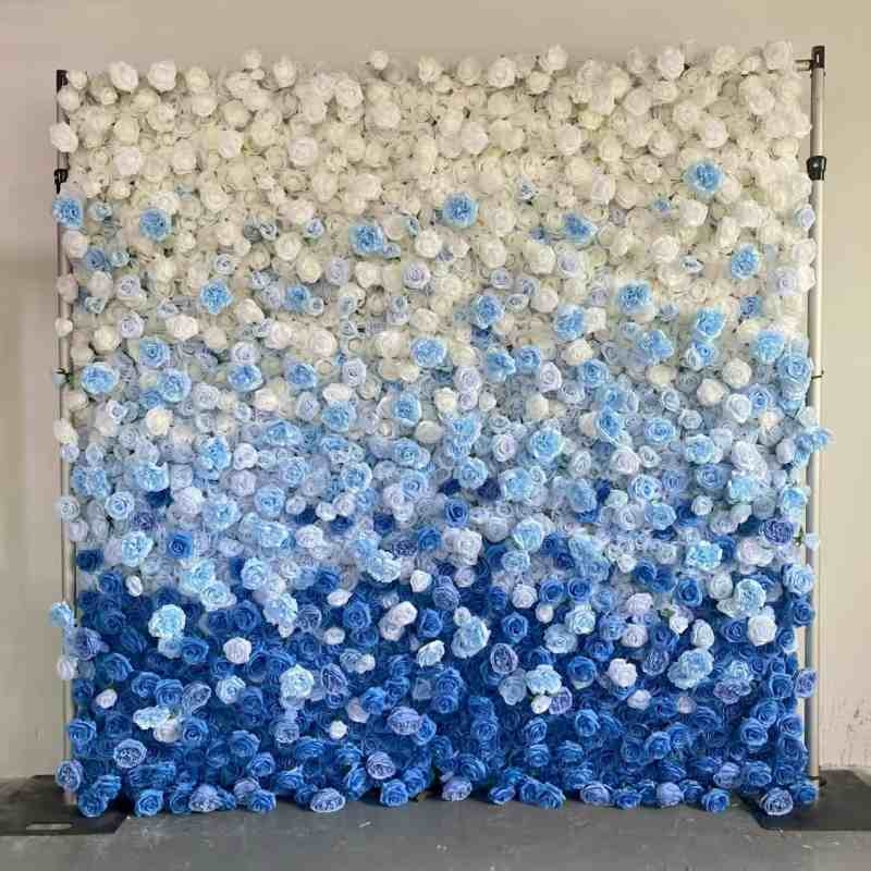 Artificial roses wall in a gradient from white to blue