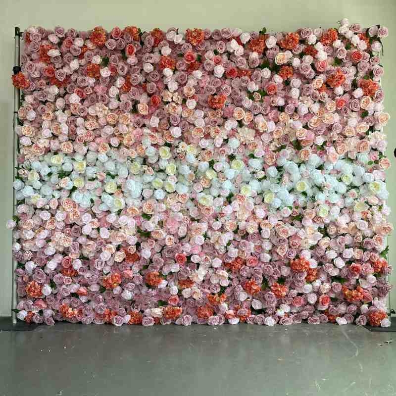 Artificial roses and hydrangeas wall in a gradient from pink to purple