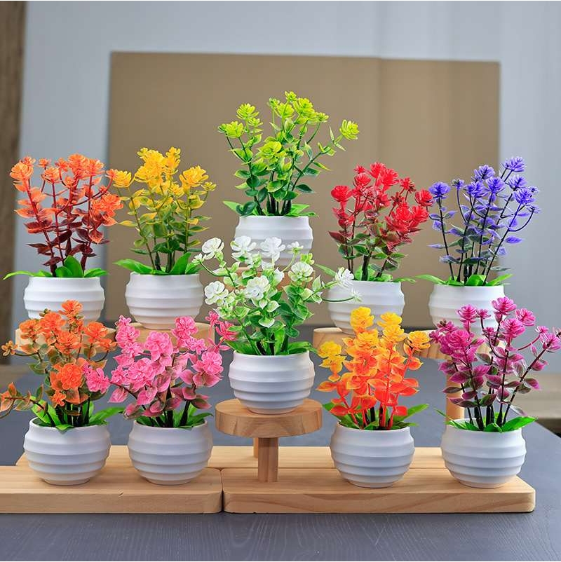 Artificial eucalyptus potted plant with white pot